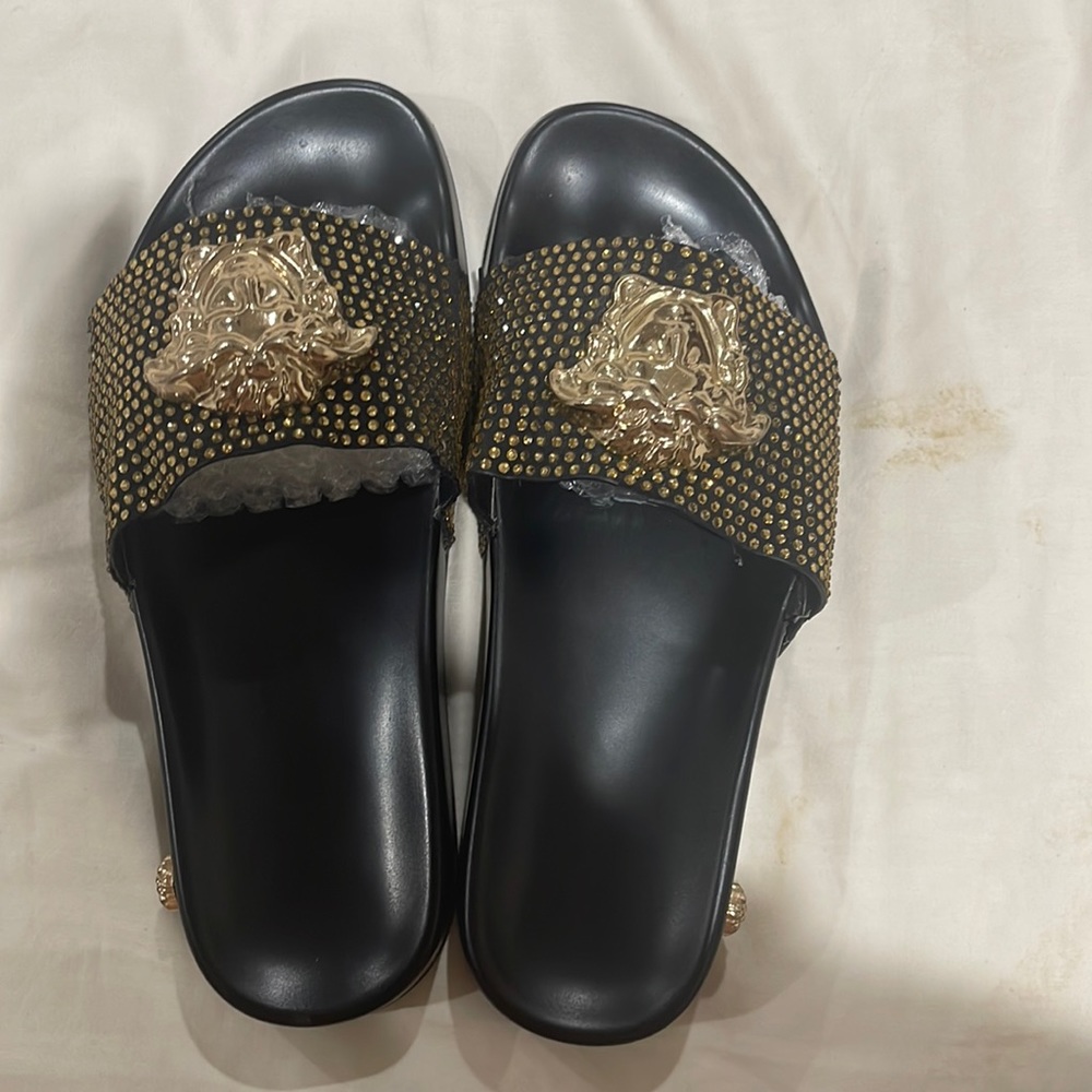 Versace Medusa Slides - size 7. Gold beaded some wear on side.